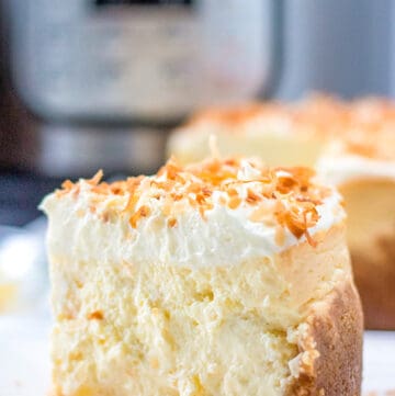 slice of pina colada cheesecake with instant pot in background