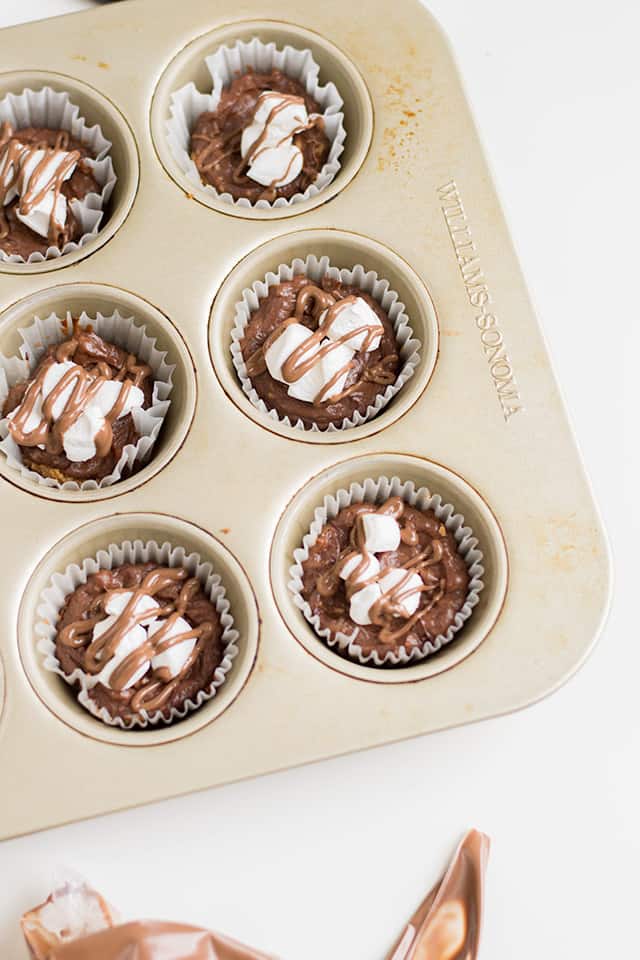 mini cheesecakes in a cupcake pan