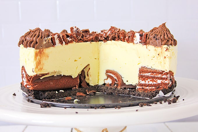 cheesecake with slices removed showing the inside cross section 